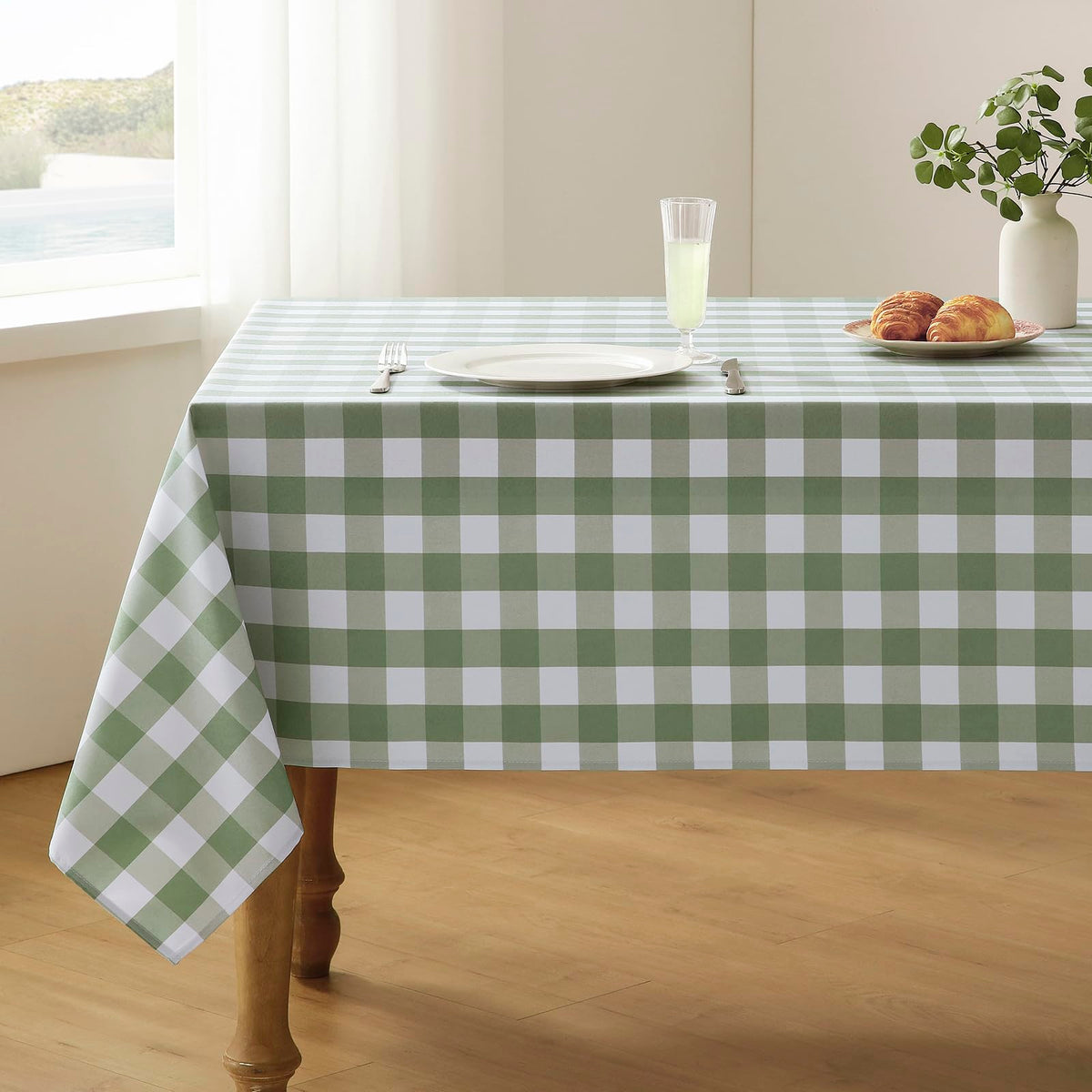 Veblandy sage green and white checkered tablecloth protects surfaces with classic dining style.