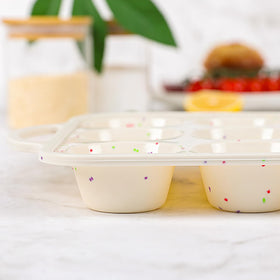 Vinino easy-release muffin pan pops muffins with minimal effort.