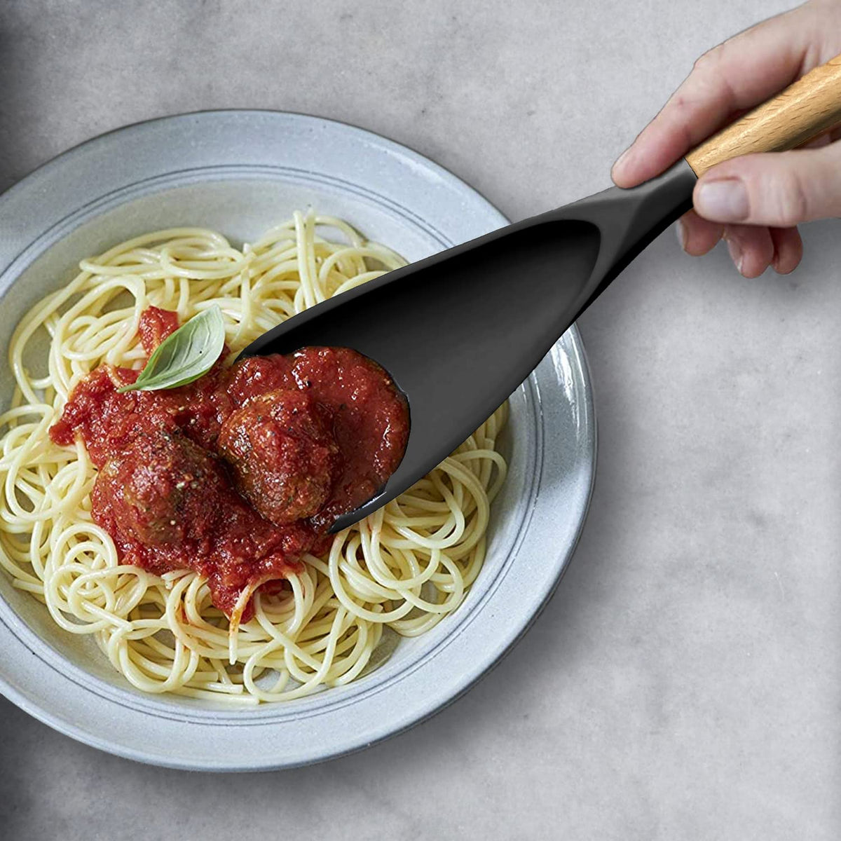 VOVOLY heat-resistant silicone spoon protects cookware from heat damage