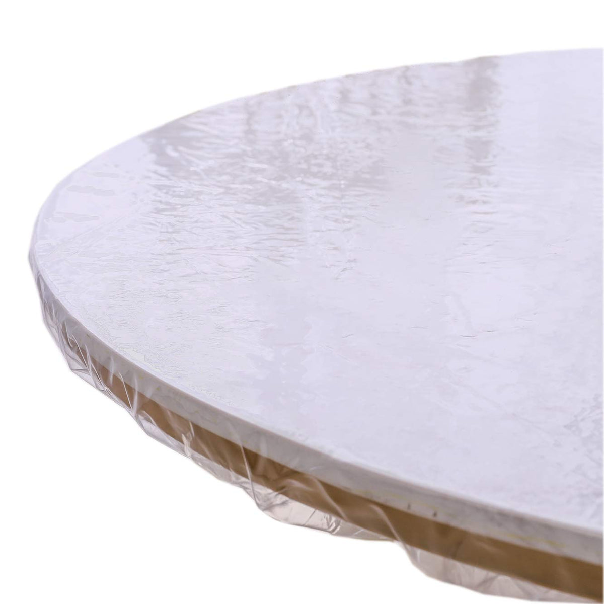 Walrus clear round vinyl tablecloth protecting a wooden round table with a transparent surface