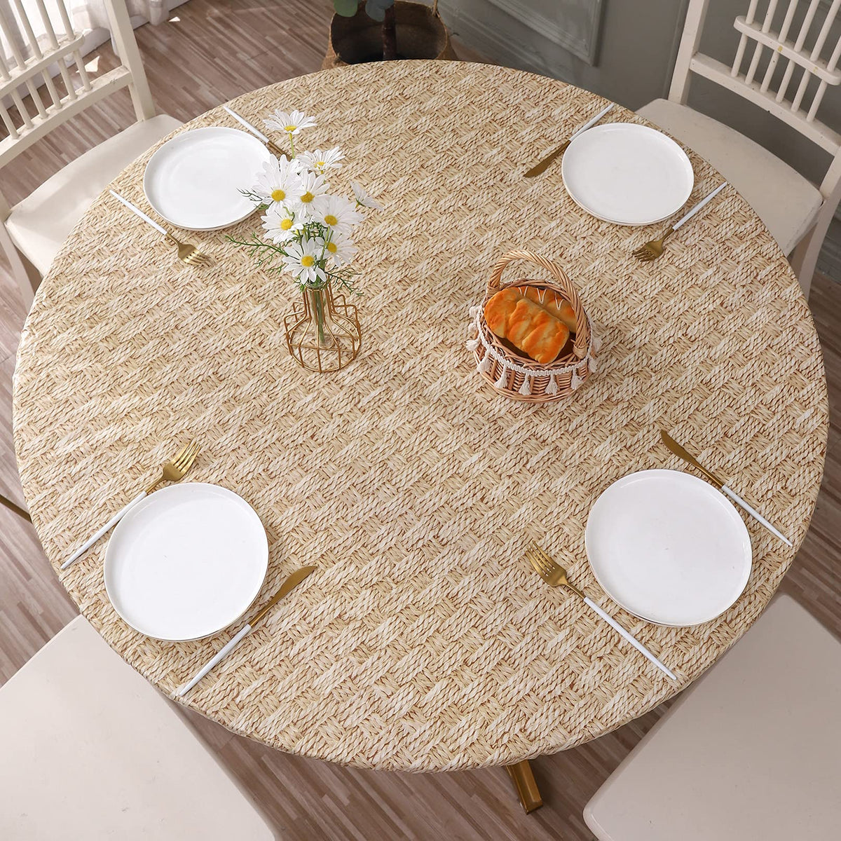 Walrus round vinyl fitted tablecloth with flannel backing fits 37–44 inch rounds and resists stains.