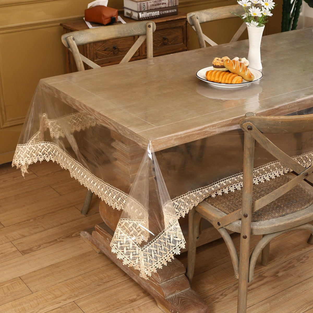 Walrus dining protector lets table details show through while shielding from messes.