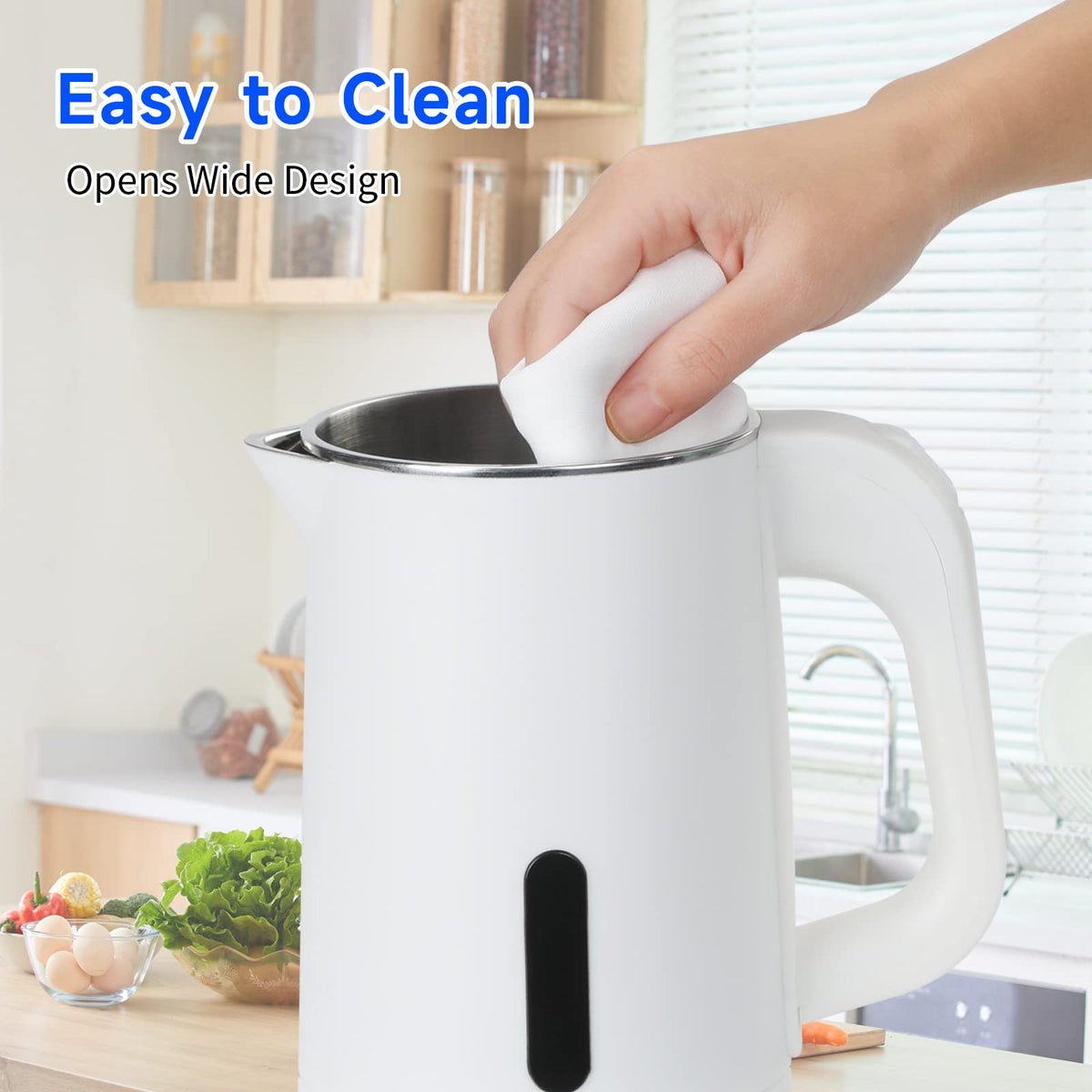 Wdcme kettle side view with ergonomic handle for easy use.