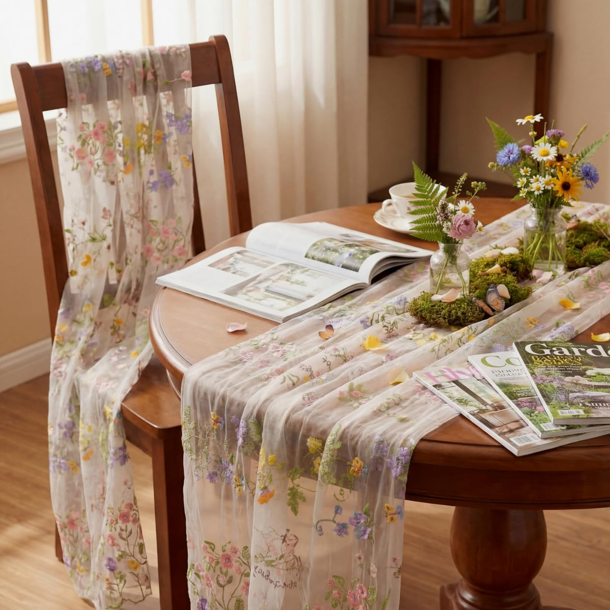 Windkream baby shower table decor with ivory floral runner