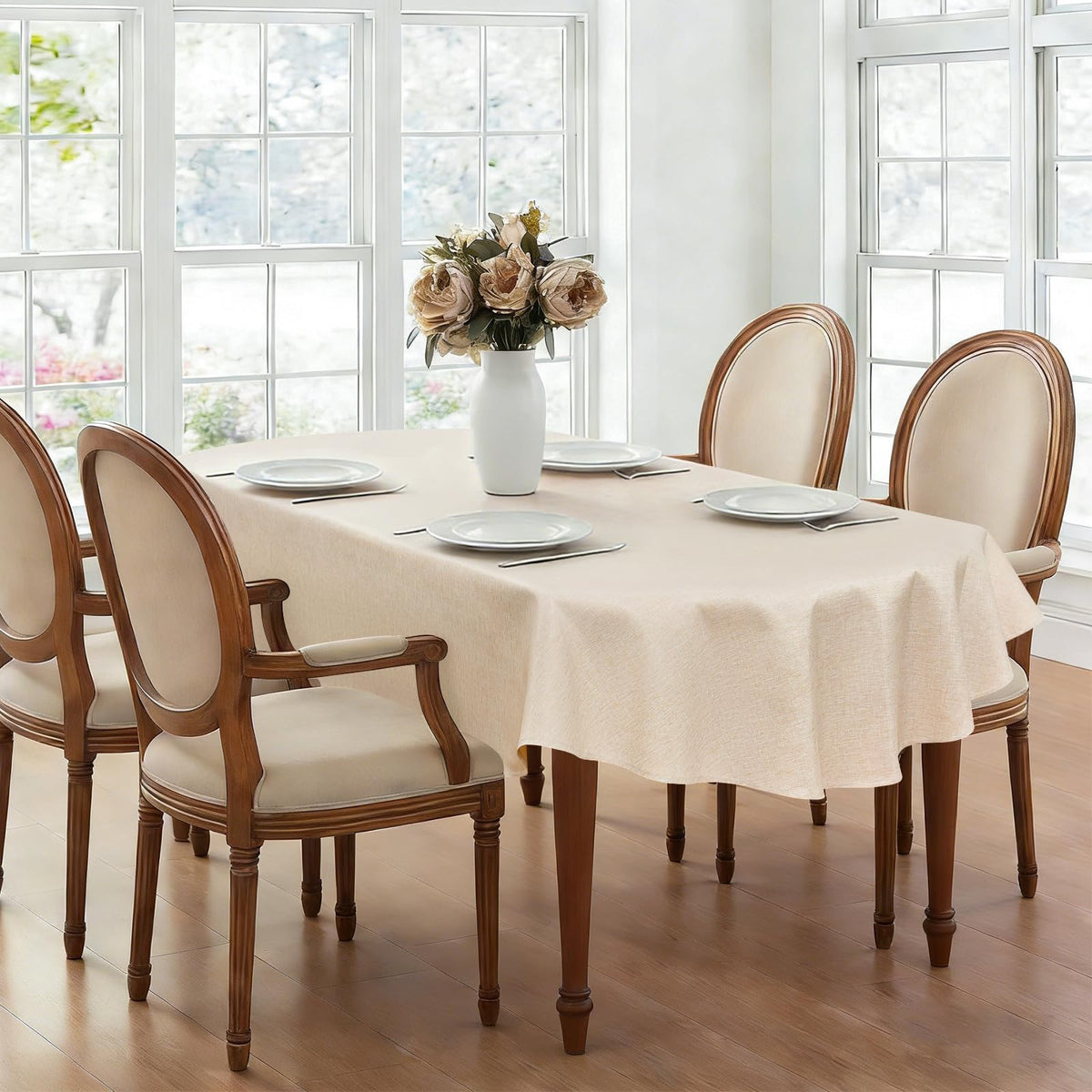 Wolkemer dining setup featuring a neutral tablecloth for a clean, versatile backdrop