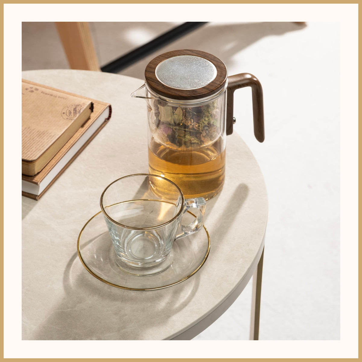 WOLTBLOOM Enchanti Tea Pot unfurling leaves inside the glass.