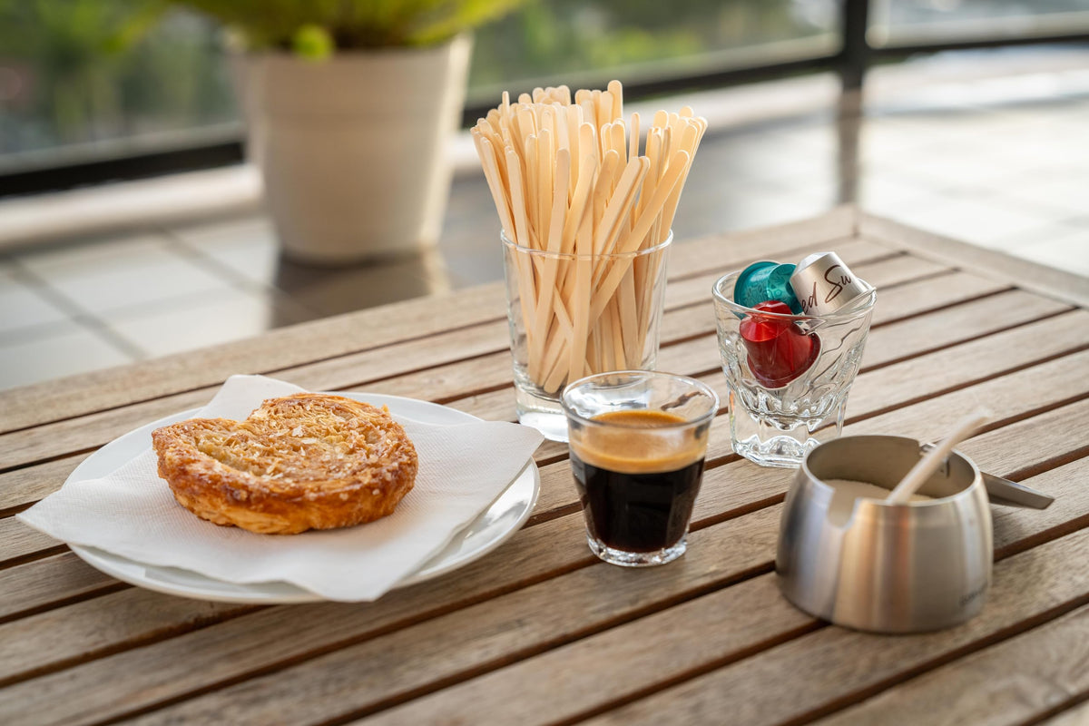 Woodable eco-friendly coffee stirrers ideal for eco-conscious cafes.
