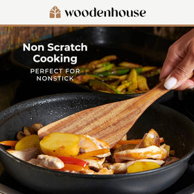 Woodenhouse teak spaghetti server for portioning and serving pasta.