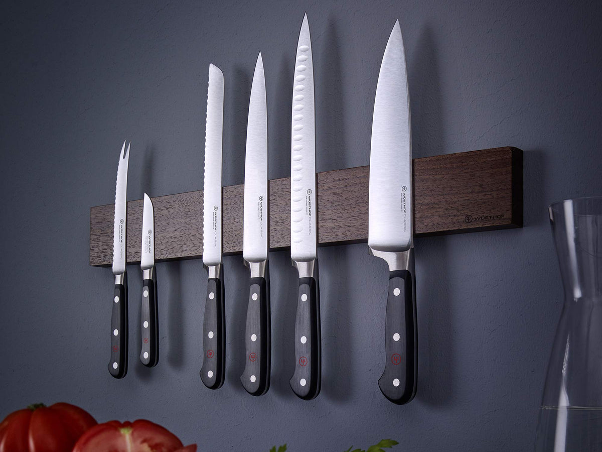 Wüsthof Classic 6-inch knife in use for chopping tasks.