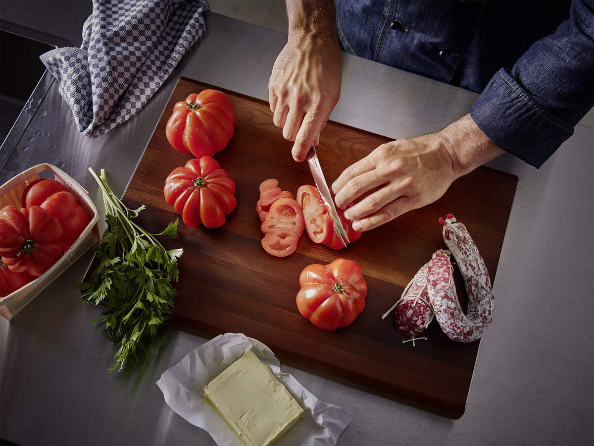 Wüsthof Classic 8-inch knife full tang design for balanced control.