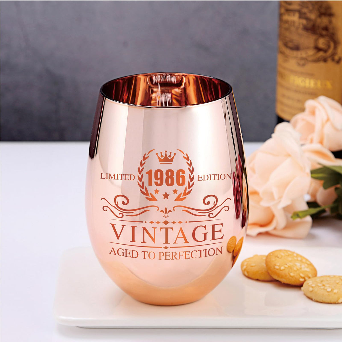 Xilaxila rose gold plated wine glass highlighting a celebratory 1986 edition.