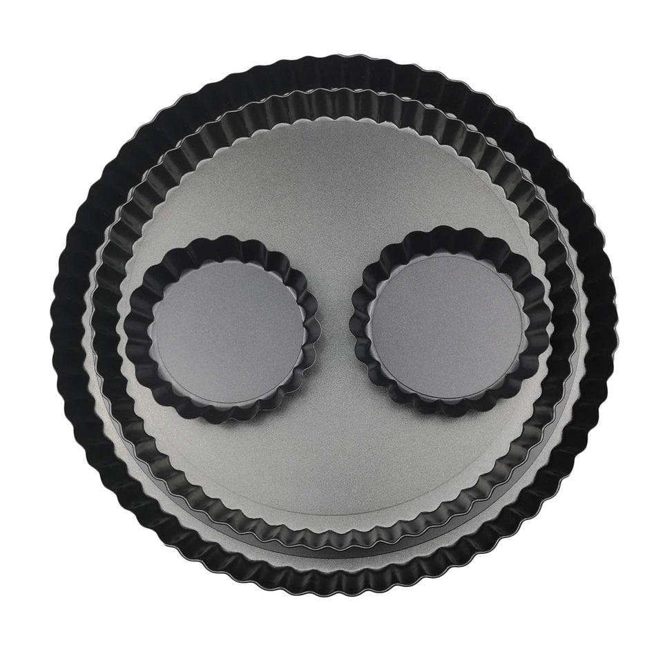 Yamteck 11-inch tart pan with removable bottom for easy demolding and clean presentation.