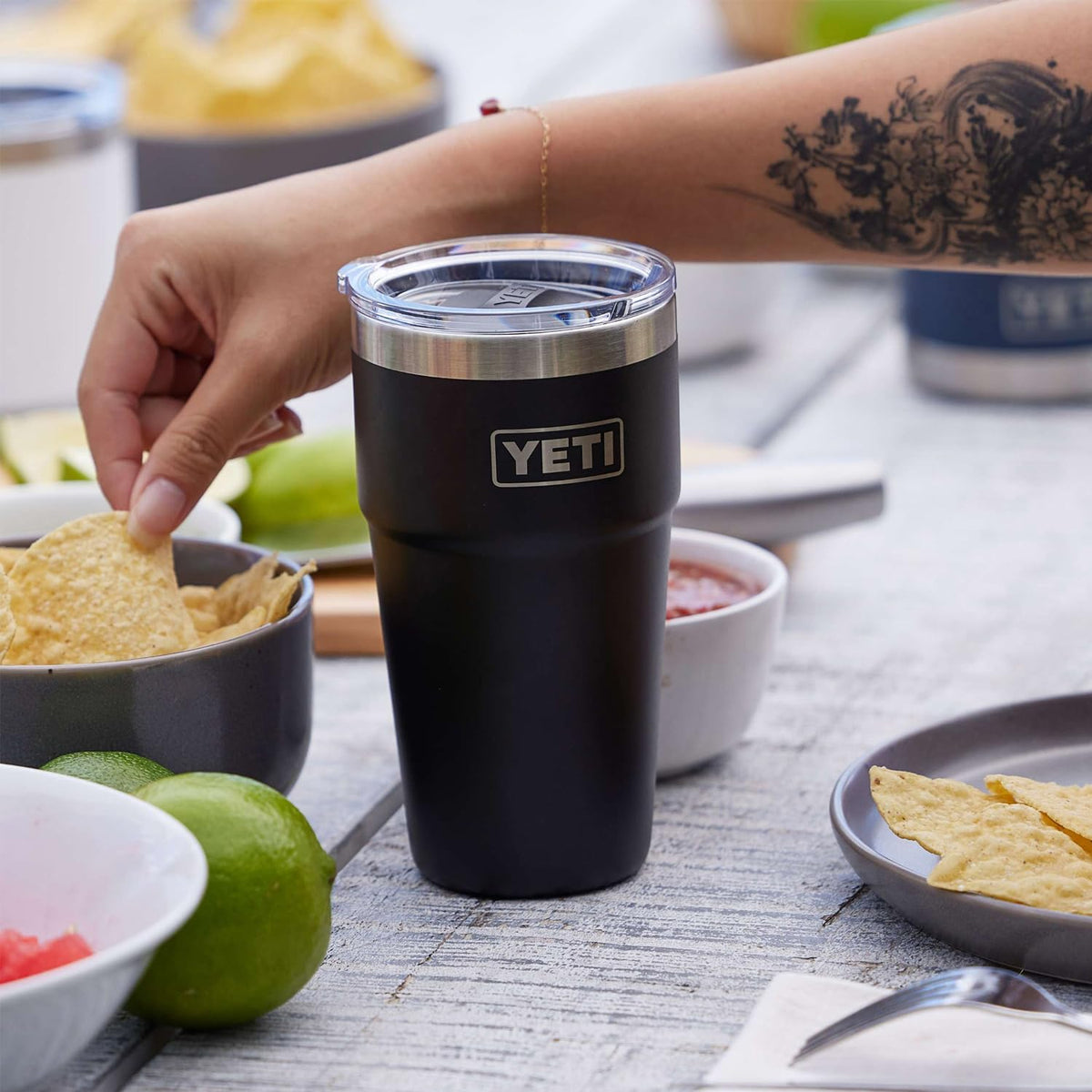YETI Rambler 20 oz Cape Taupe insulated-wall preserves drink temperature during outings.