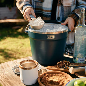 YETI Rambler Beverage Bucket navy double-wall vacuum insulation keeps ice longer and drinks cooler