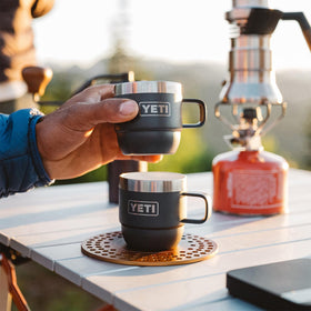 YETI Rambler in camp kitchen setup for espresso on outdoor adventures.