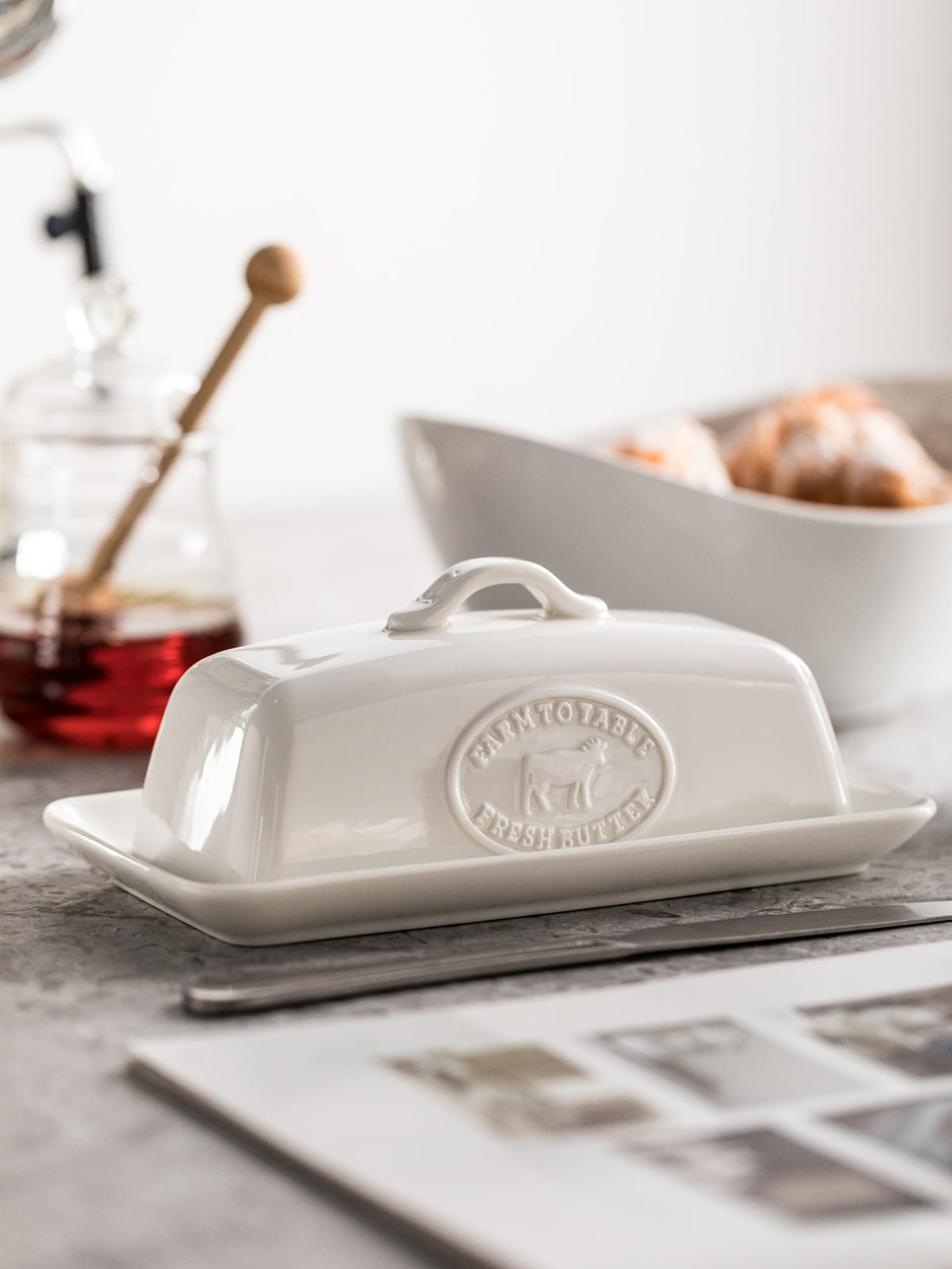 YHOJOY porcelain butter holder highlights sturdy construction for everyday kitchen use.