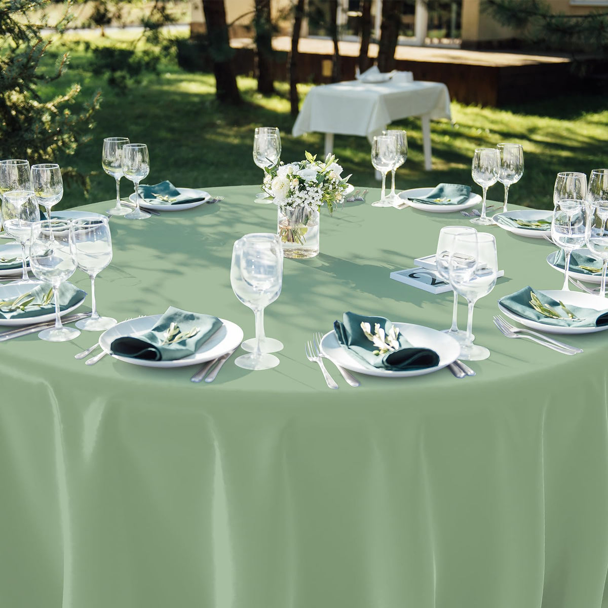 YIDAKO sage-green tablecloth as dust sheet highlights versatile use.