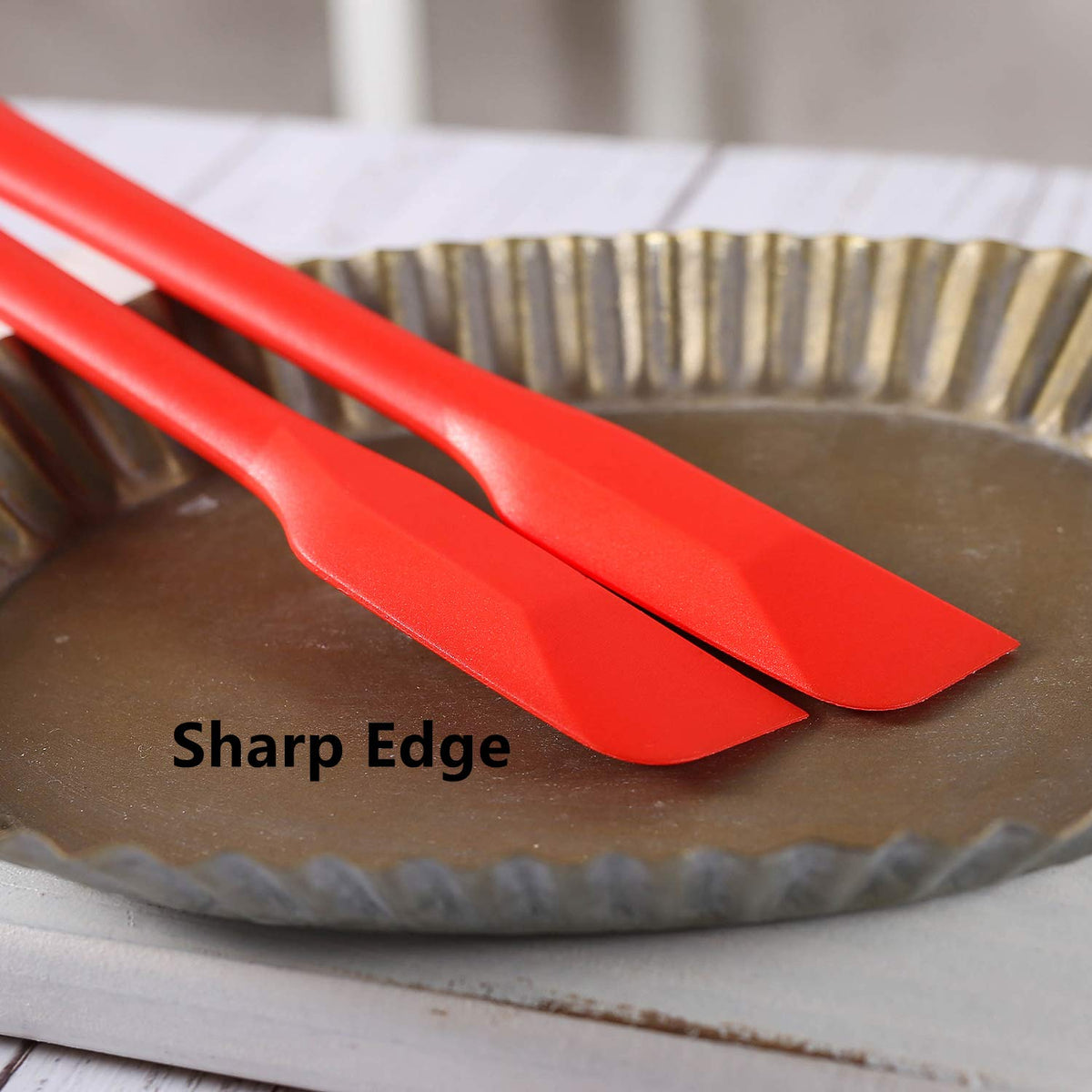 Yoku Made sturdy, flexible head spatula — balanced control during scraping.