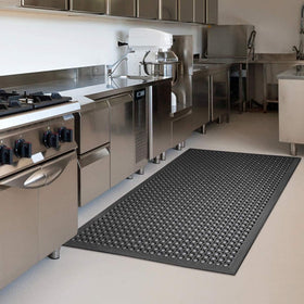 Yoshiko rubber floor mat with drainage holes resists grease and water