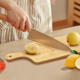 YOUKE OLA multipurpose bamboo board for breads, cheeses, meats, and veggies.