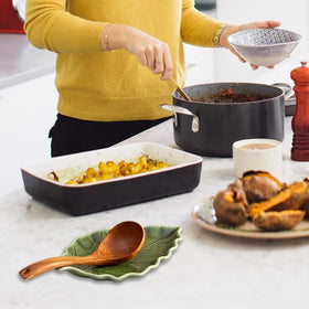 YumiPLUS ceramic leaf spoon rest complements cottage-core kitchen decor.