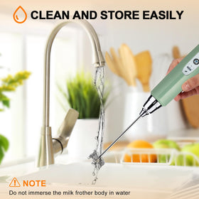 YUSWKO Granite Green milk frother in use in cup demonstrates compact mess free operation