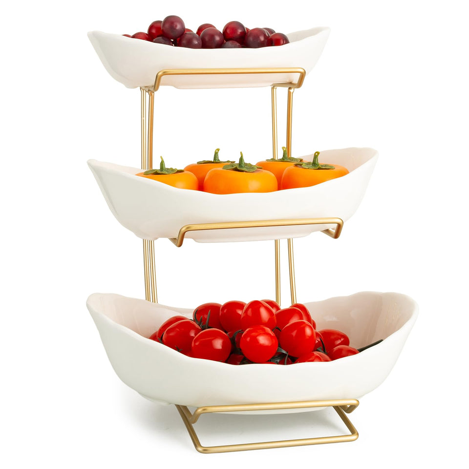 YYW 3-tier fruit bowl on counter with fresh fruit display and white-gold ceramic finish