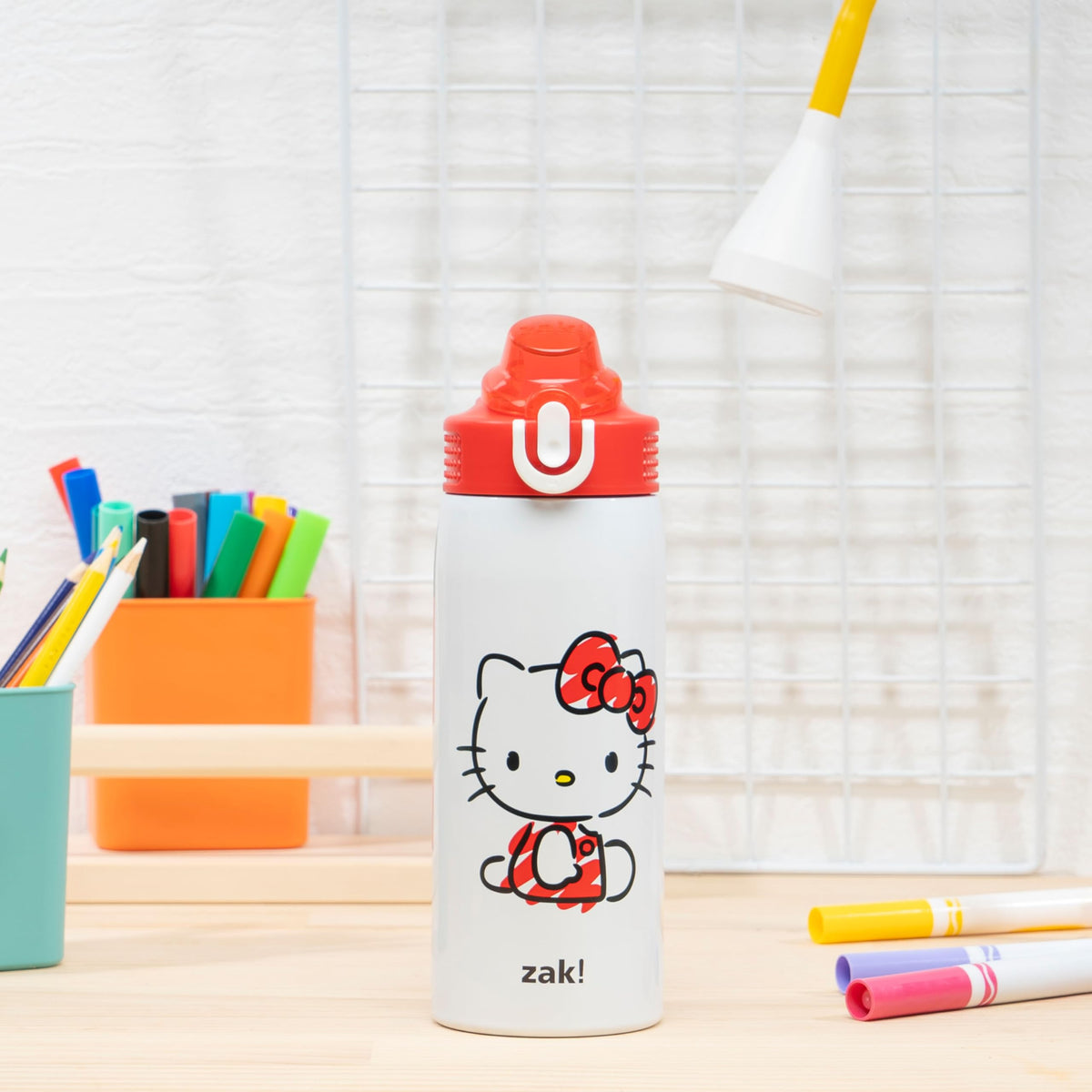 Sanrio Hello Kitty spout close-up on safety flip-lock for leak prevention