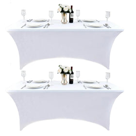 ZarzaaSik 8ft white spandex table cover fitted on folding table for a neat display