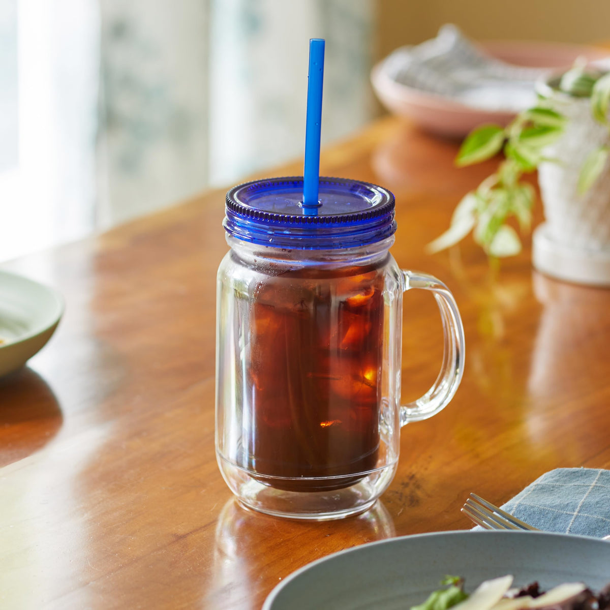 Zephyr Canyon wide-mouth mason jars on kitchen counter for easy filling.