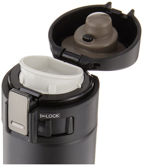 Zojirushi mug lid showing secure flip seal and safety lock for spill prevention.