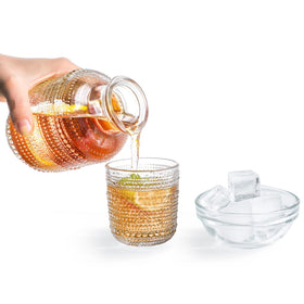 ZOOFOX clear night carafe with lid keeps beverages fresh and spill-free.