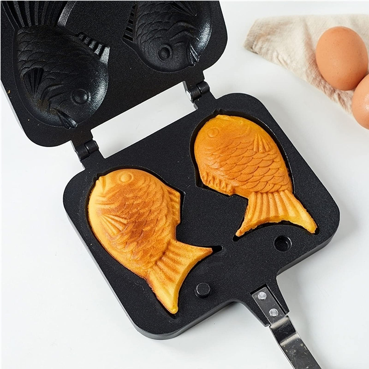 ZOOFOX Taiyaki pan heat-resistant handles stay cool during cooking.