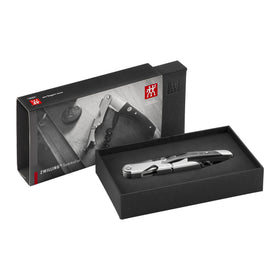 ZWILLING Sommelier foil cutter in action for clean foil removal