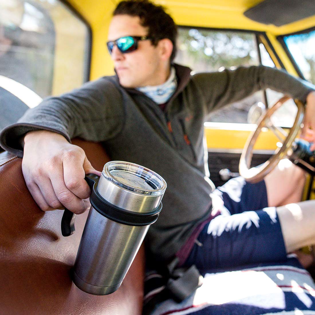 ZYTC 30oz tumbler handle in hand offering comfortable grip.